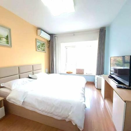 Qingdao Mi Apartment Екстер'єр фото