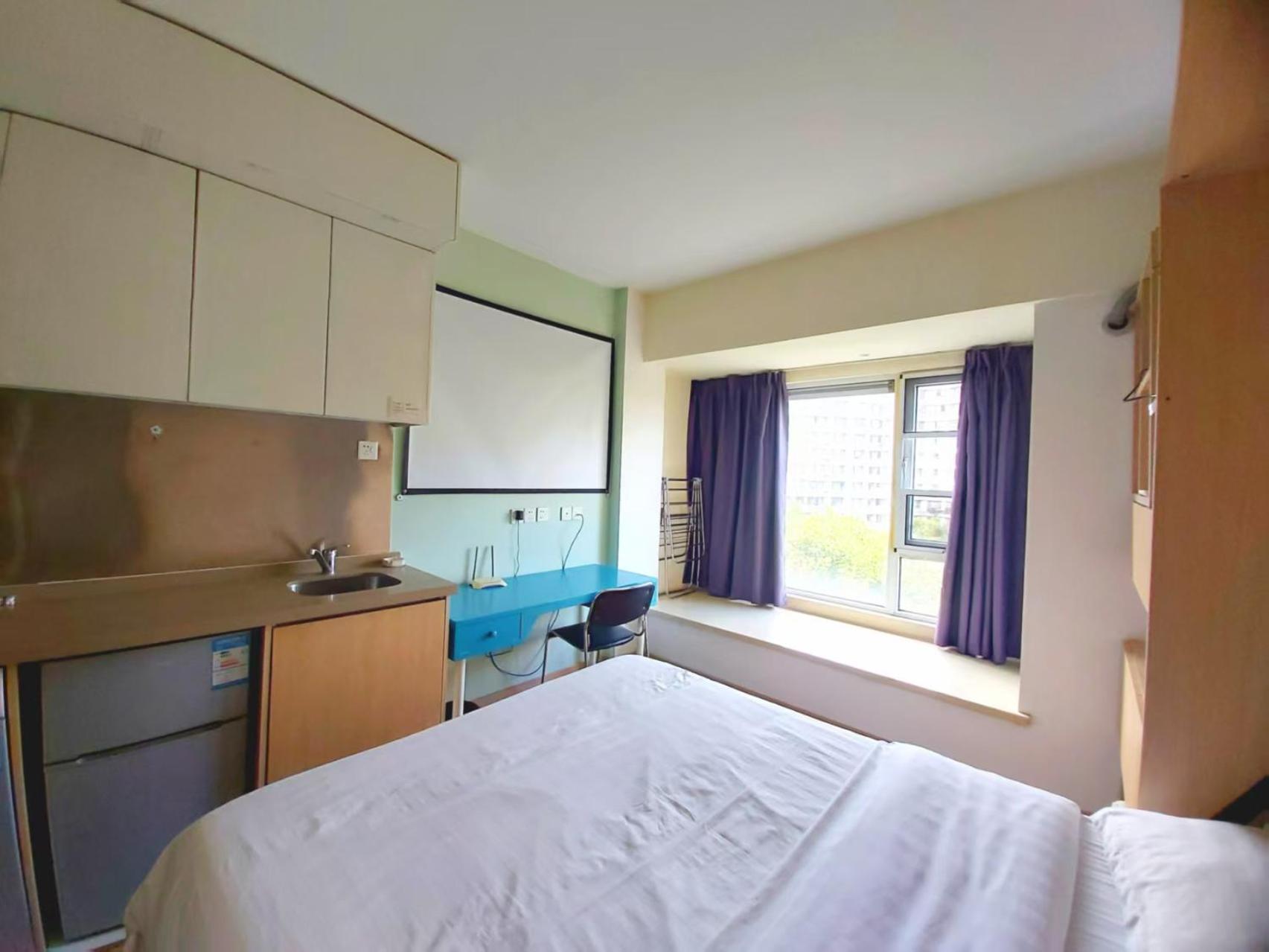 Qingdao Mi Apartment Екстер'єр фото