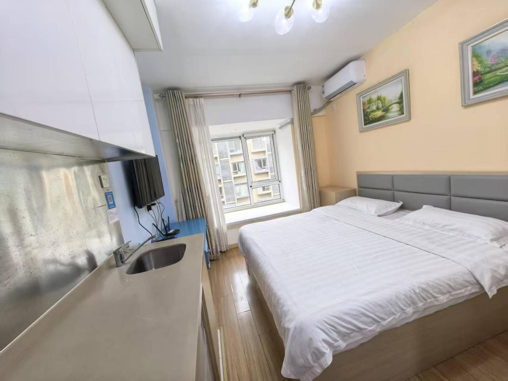 Qingdao Mi Apartment Екстер'єр фото