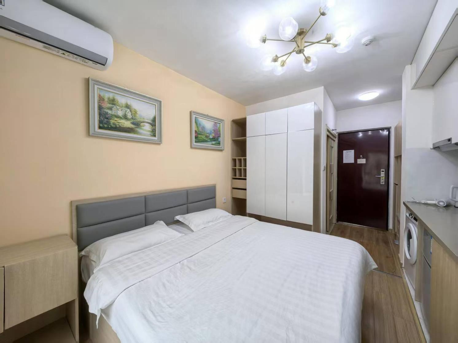 Qingdao Mi Apartment Екстер'єр фото