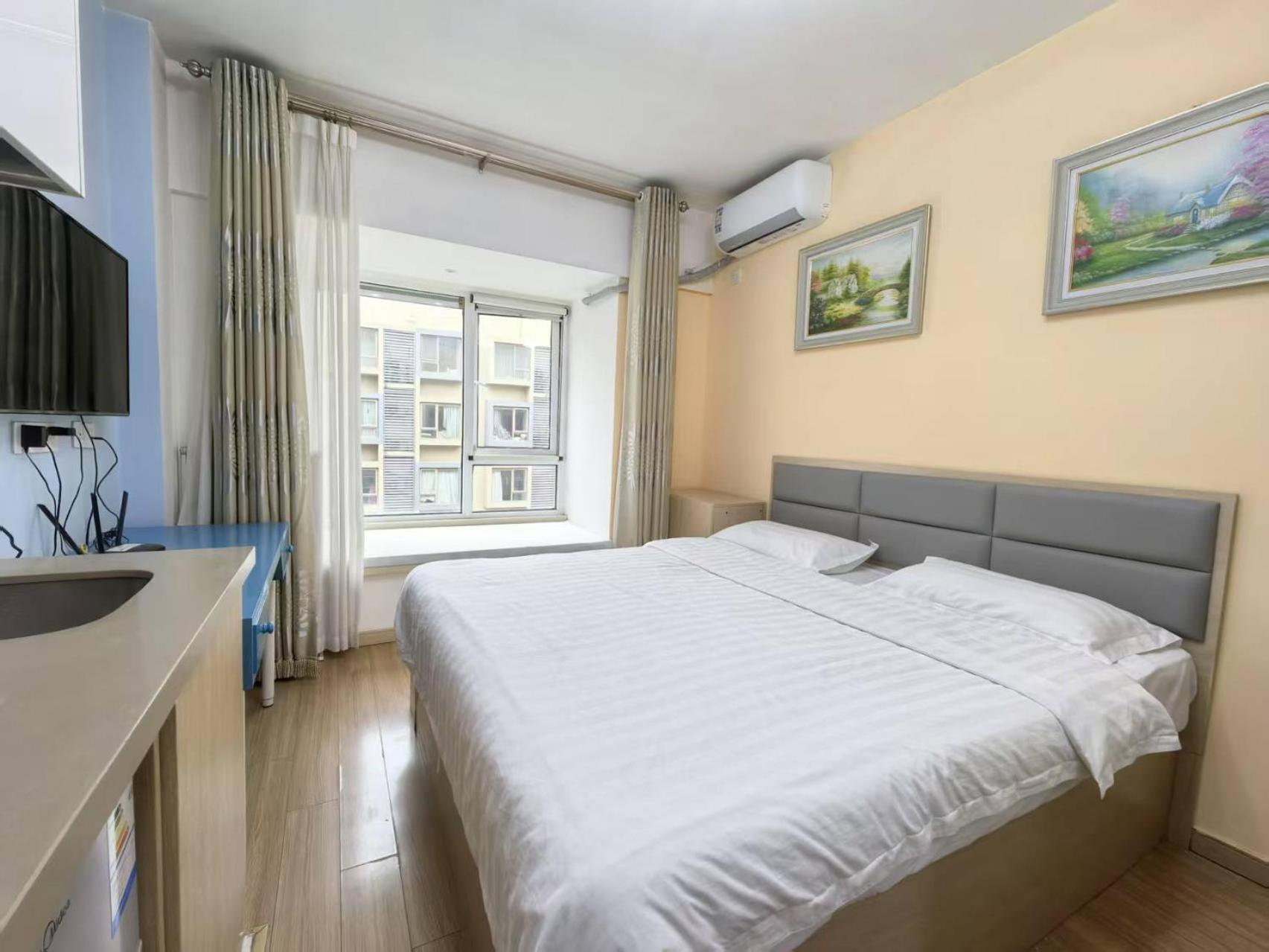 Qingdao Mi Apartment Екстер'єр фото