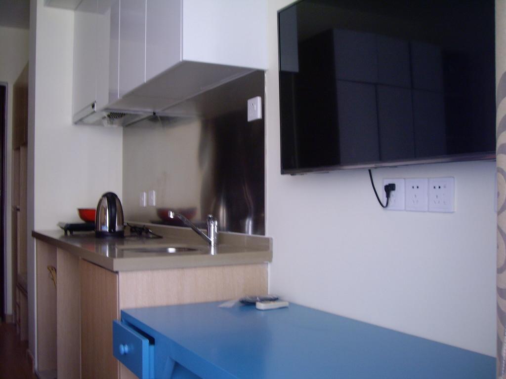 Qingdao Mi Apartment Екстер'єр фото